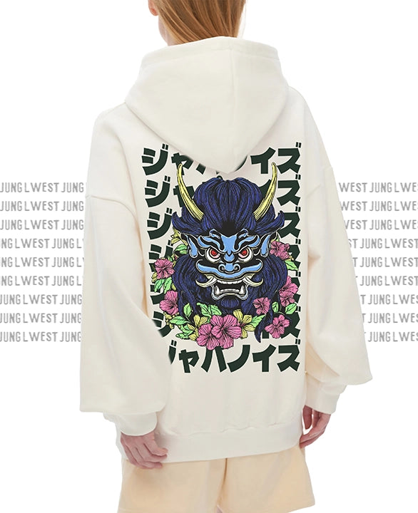 Person wearing a hoodie with a dragon design and text on the back