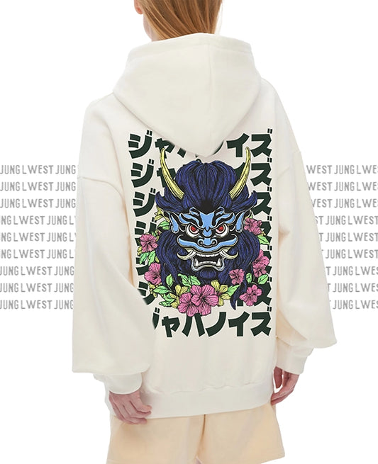 Person wearing a hoodie with a dragon design and text on the back